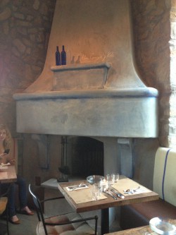 The working fireplace (with the saying "alma, corazón y vita" written on it) is fired up in the colder months.