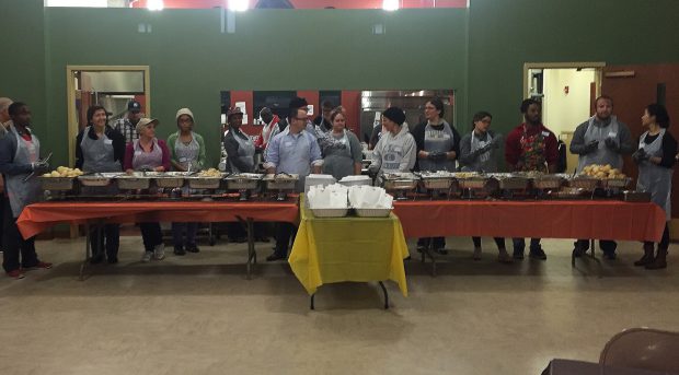 Volunteers getting ready to serve the annual Thanksgiving-Eve dinner