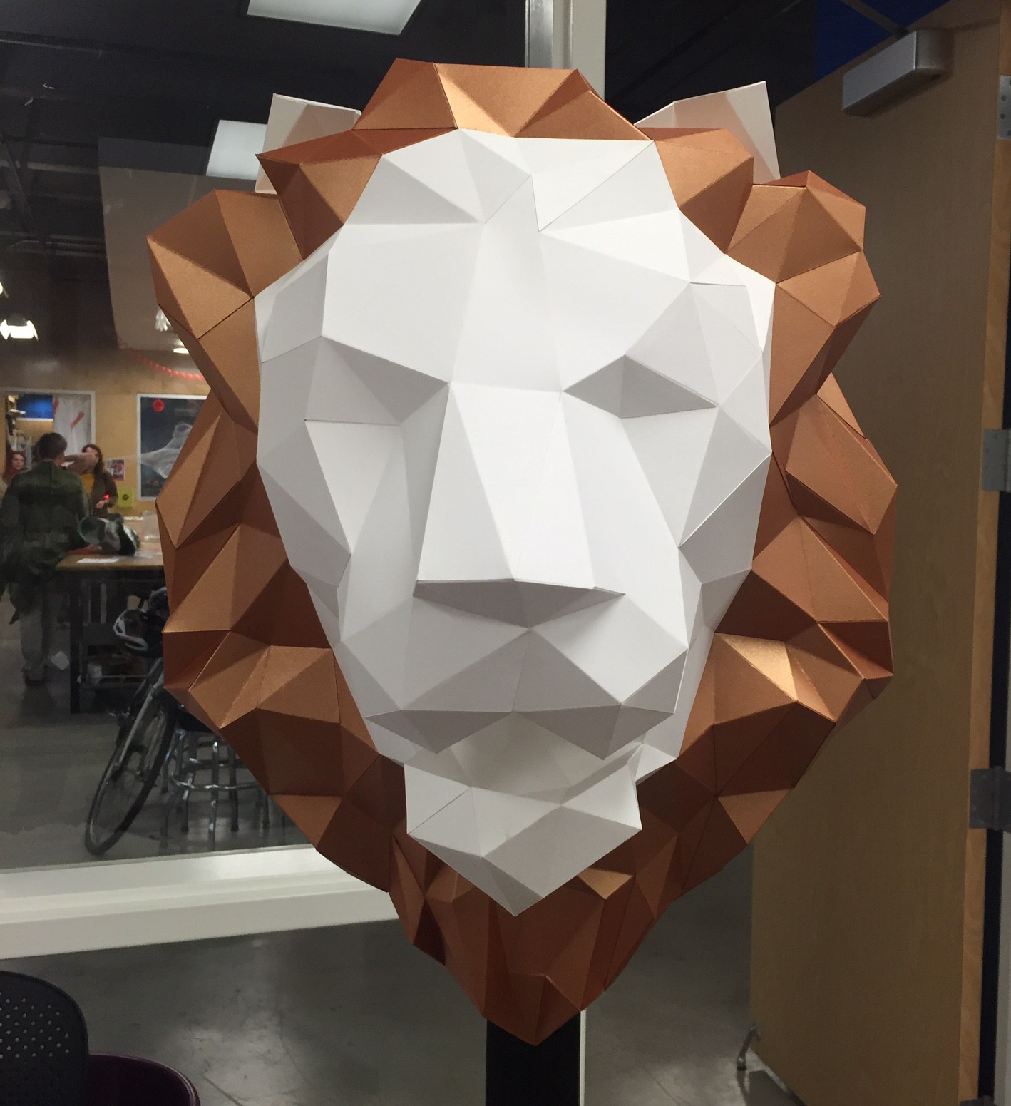 paper lion head scuplture